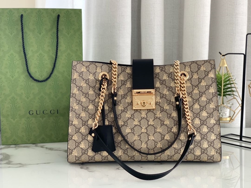 G*u*i shopping bags